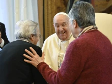 Pope Francis shares a joyful moment with members of the Union of St. Catherine of Siena Missionary Teachers during an audience in the Vatican's Clementine Hall, Jan. 4, 2025.