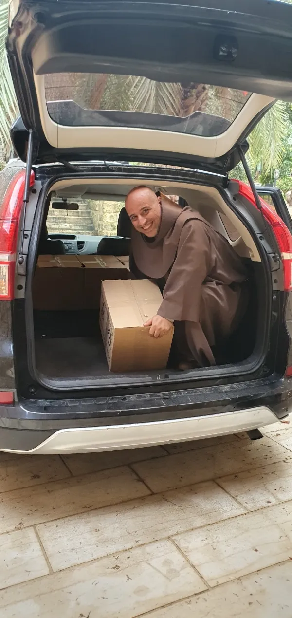 Franciscan Father Toufic Bou Mehri brings food parcels to the families of Deir Mimas, a little Lebanese village a few miles from the Israeli border. The groceries are purchased with the support of the Apostolic Vicariate of Beirut and of the association Pro Terra Sancta, affiliated with the Custody of the Holy Land. Credit: Photo courtesy of Father Toufic Bou Mehri