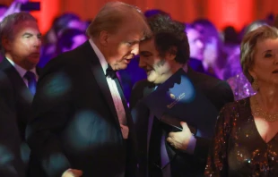 Argentine President Javier Milei walks past President-elect Donald Trump as they attend the America First Policy Institute Gala held at Mar-a-Lago on Nov. 14, 2024, in Palm Beach, Florida. Credit: Joe Raedle/Getty Images