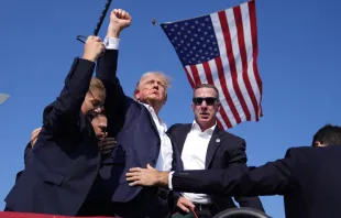 Republican presidential candidate former President Donald Trump is surrounded by U.S. Secret Service agents at a campaign rally, Saturday, July 13, 2024, in Butler, Pennsylvania. Credit: AP Photo/Evan Vucci