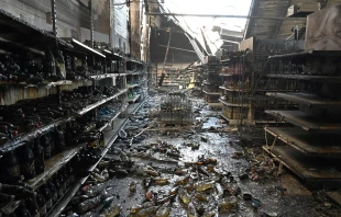 A photograph taken on June 28, 2022 shows charred goods in a grocery store of the destroyed Amstor mall in Kremenchuk, one day after it was hit by a Russian missile strike according to Ukrainian authorities. Photo by Genya Savilov/AFP via Getty Images