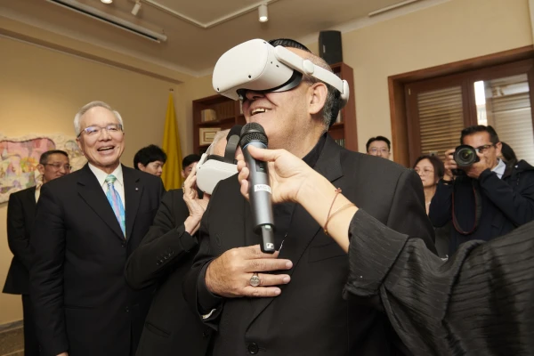 Ambassador Matthew Lee (left) and Cardinal Jose Tolentino wear the headsets at the Republic of China’s Embassy to the Holy See on Monday, Nov. 11, 2024, at the Vatican. Credit: Embassy of the Republic of China to the Holy See