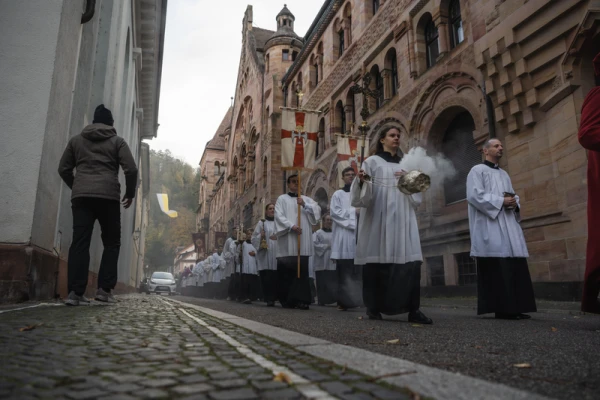 The liturgical procession outside the Freiburg Cathedral on Nov. 17, 2024, where Cardinal Kurt Koch, prefect of the Vatican’s Dicastery for Promoting Christian Unity, presided over the beatification Mass for Father Max Josef Metzger. Metzger was a Catholic priest executed by the Nazi regime in 1944 for his peace activism and ecumenical work. Credit: Photo courtesy of the Archdiocese of Freiburg, Germany