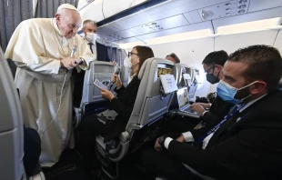 Pope Francis speaks during an in-flight press conference on the journey from Athens to Rome, Dec. 6, 2021. Vatican Media.