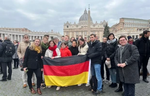 Tabea Schneider (far left) with a group of other pilgrims who traveled 20 hours by bus from Cologne, Germany, to attend the funeral of Pope Benedict XVI on Jan. 5, 2023, in St. Peter's Square at the Vatican. Courtney Mares / CNA