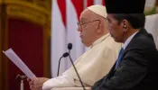 Pope Francis speaks next to Indonesian President Joko Widodo at a meeting with the authorities, civil society, and the diplomatic corps in Jakarta on Sept. 4, 2024.