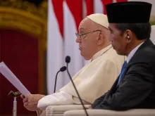 Pope Francis speaks next to Indonesian President Joko Widodo at a meeting with the authorities, civil society, and the diplomatic corps in Jakarta on Sept. 4, 2024.