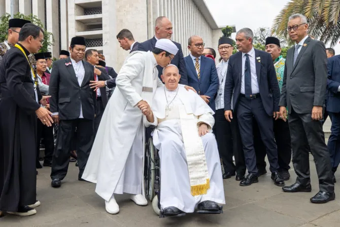 Grand Imam Nasaruddin Umar kisses the head of Pope Francis after the signing of the Istiqlal Joint Declaration 2024 in Jakarta, Indonesia, Sept. 5, 2024.