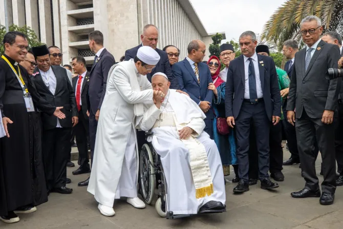 Pope Francis kisses the hand of Grand Imam Nasaruddin Umar after the signing of the Istiqlal Joint Declaration on Sept. 5, 2024, in Jakarta, Indonesia.