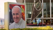 A smiling Pope Francis is depicted on a sign outside the APEC Haus in Port Moresby, Papua New Guinea, on the occasion of the pontiff's visit, Sept. 7, 2024.