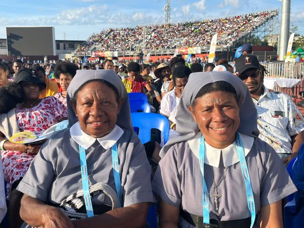 Sister Agnes Sina (left) and Sister Veronica Tamai from the Handmaids of the Lord community woke up at 2 a.m. to travel to Port Moresby and attend Mass with Pope Francis at Sir John Guise Stadium, Sept. 8, 2024. Credit: Courtney Mares/CNA