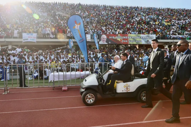 Pope Francis arrives to celebrate Mass at Sir John Guise Stadium