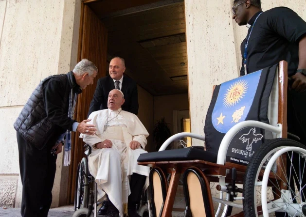 Father Enrique “Kike” Figaredo on Oct. 23, 2024, presents Pope Francis with a wheelchair made by land mine survivors in Cambodia.?w=200&h=150