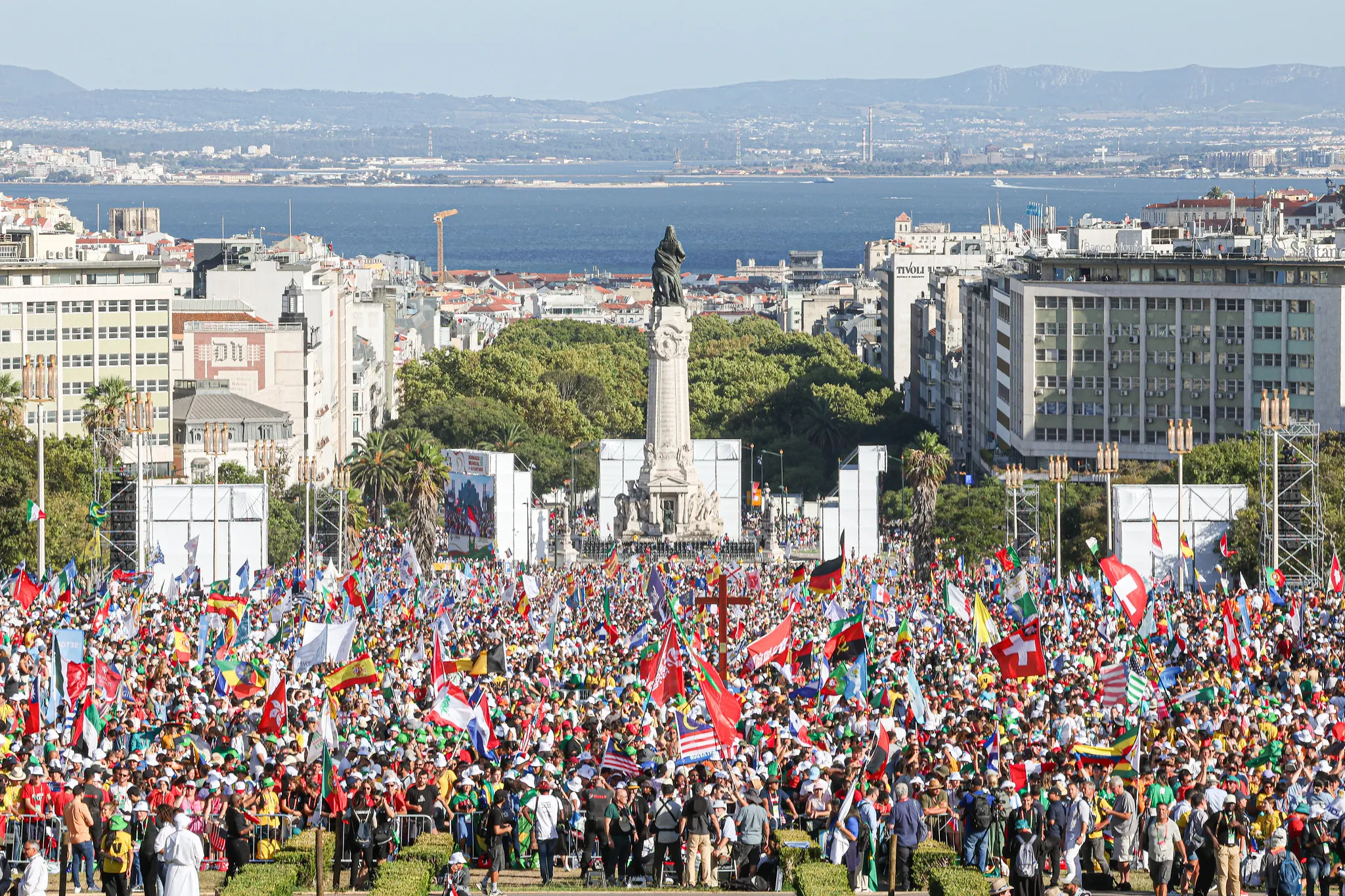 A view of the crowd and nearby waterfront at the opening Mass for World Youth Day in Lisbon, Portugal on Aug. 1, 2023.?w=200&h=150