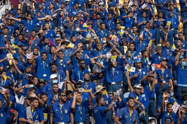 Young people cheer at Sir John Guise Stadium in Port Moresby, Papua New Guinea, Monday, Sept. 9, 2024. Credit: Daniel Ibáñez/CNA